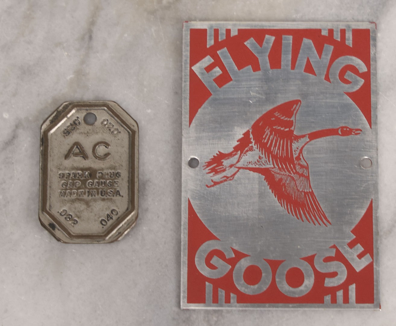 Lot 274 - Grouping Of 13 Vintage Advertising And Metal Pieces Including Ford And Studebaker Keys, Sutter's Hi Speed Turtle Bottle Opener, Acme Thunderer Whistles, S.S. Kresge Co. Feeler Gauge, And Shell Service Scraper