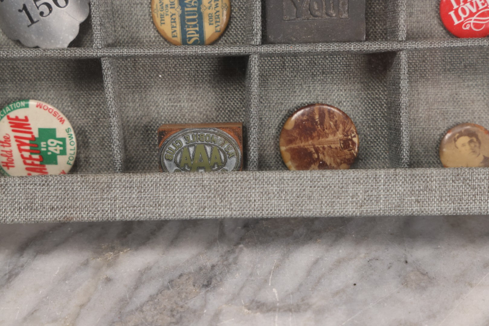 Lot 276 - Modern Display Case With Vintage Smalls And Advertising Pieces Including Candy Machine Door, Bicycle License, Pinback Buttons, Printing Block, And Metal Toy Football Player