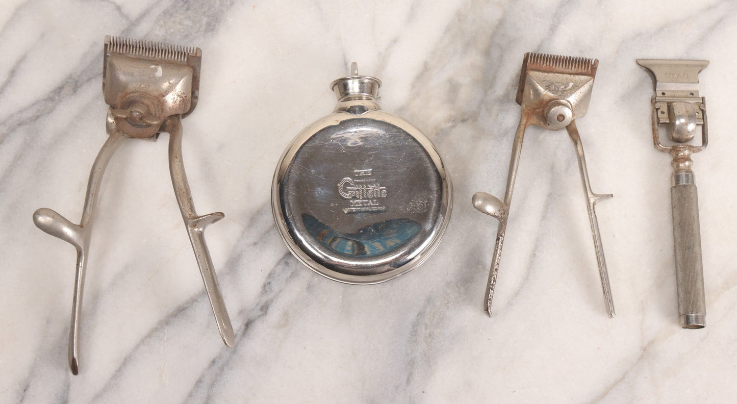 Lot 280 - Grouping Of Four Antique Shaving Items Including Gillette Metal Hot Water Bottle, Hand-Operated Clippers, And Stag Co. Razor Blade Sharpener