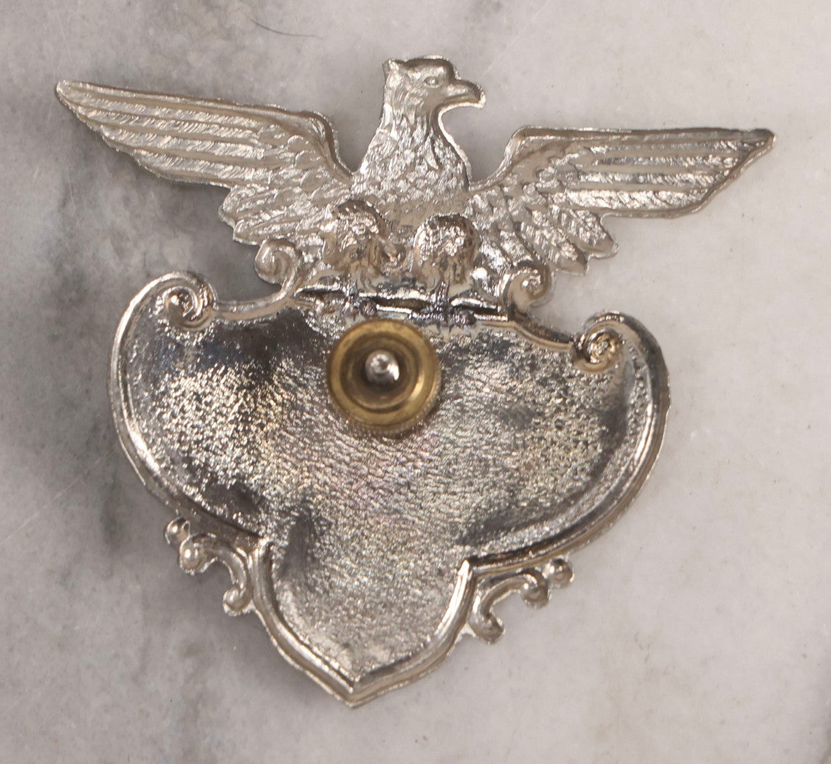 Lot 284 - Pair Of Vintage Ohio Police Patrolman's Standard Wreath Badges With Eagle Design, Numbered 4764 And 7723