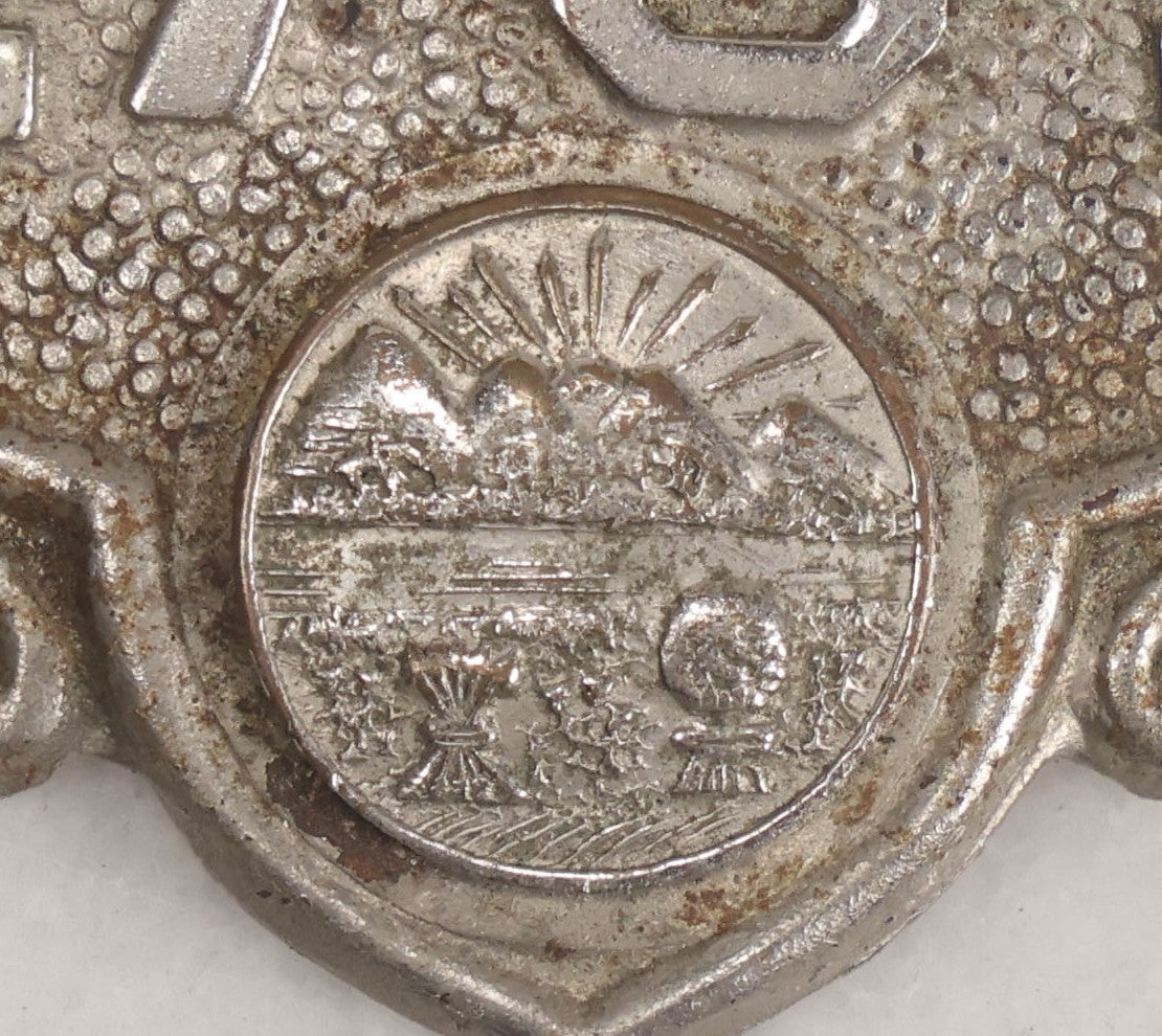 Lot 284 - Pair Of Vintage Ohio Police Patrolman's Standard Wreath Badges With Eagle Design, Numbered 4764 And 7723