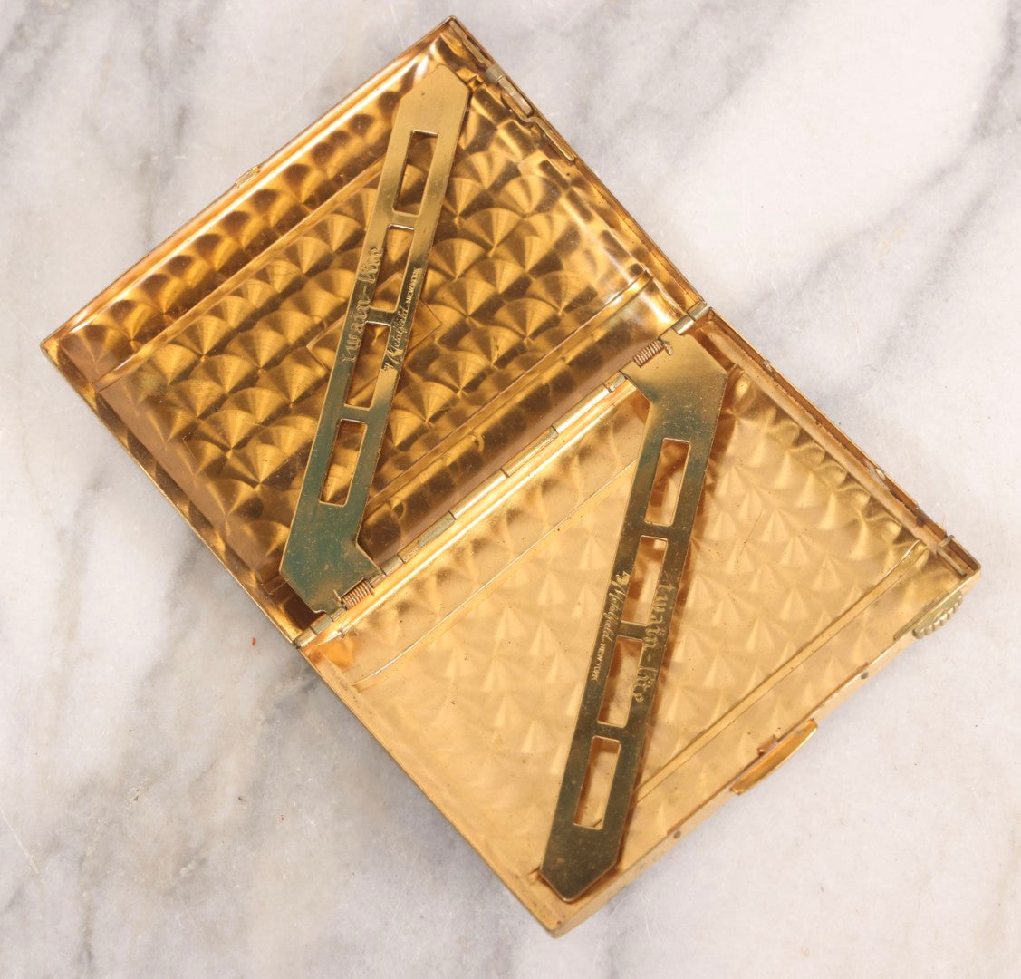 Lot 285 - Vintage Twain-Lite Cigarette Holder With Leather Case By Metalfield, New York, With Brushed Brass Interior And Spring-Loaded Arms