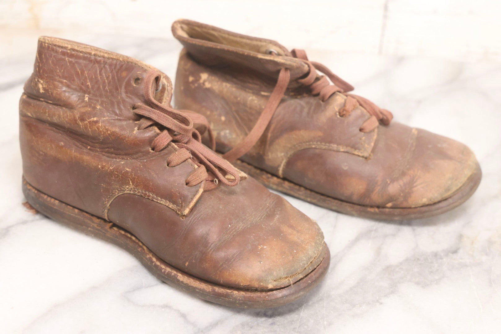 Lot 289 - Two Pairs Of Antique Leather Children's Shoes Including Brown High-Top Lace-Up Boots And Cream And Black High-Button Boots