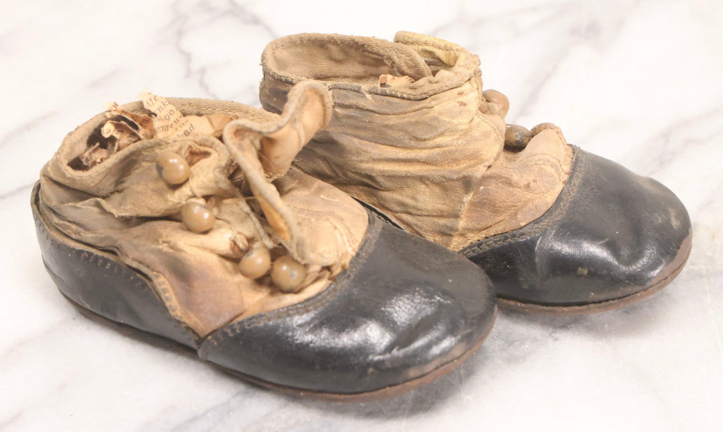 Lot 289 - Two Pairs Of Antique Leather Children's Shoes Including Brown High-Top Lace-Up Boots And Cream And Black High-Button Boots