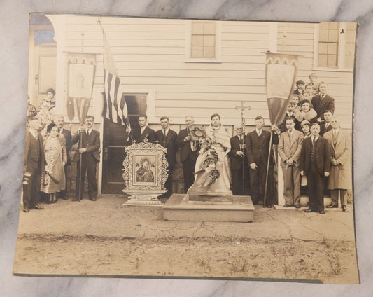 Lot 293 - Antique Unmounted Photograph Depicting Priest And Churchgoers Holding Banners Before Large Icon And Bell, Circa 1914, Handwritten Note On Verso Identifies Wasyl Pilch Holding Gospel, Founder Of St. Peter & Paul Church