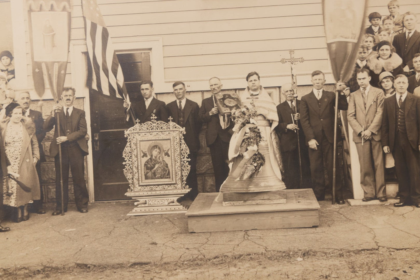 Lot 293 - Antique Unmounted Photograph Depicting Priest And Churchgoers Holding Banners Before Large Icon And Bell, Circa 1914, Handwritten Note On Verso Identifies Wasyl Pilch Holding Gospel, Founder Of St. Peter & Paul Church