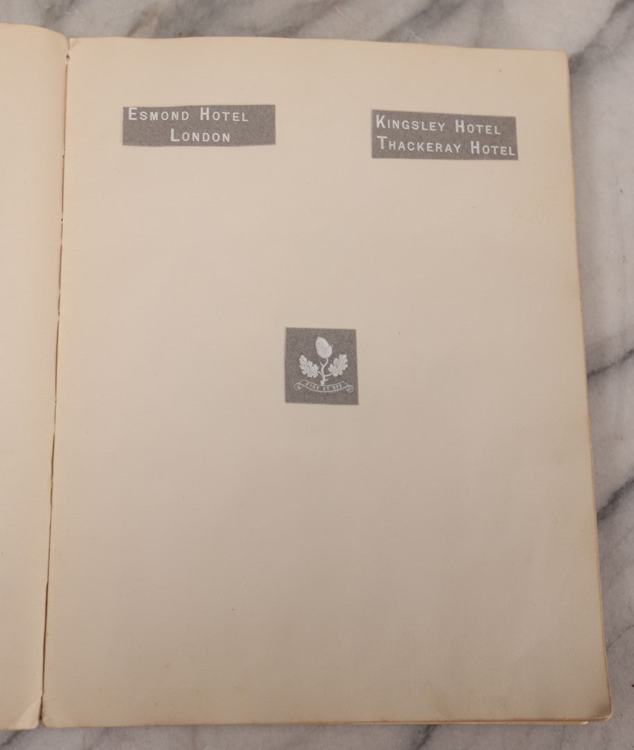 Lot 294 - Antique Scrapbook With Clipped Logos, Seals, And Institutional Names From Colleges, Hotels, Clubs, Banks, Government Offices, And More, Arranged By Color Throughout 20+ Pages, Marbled Cover Boards