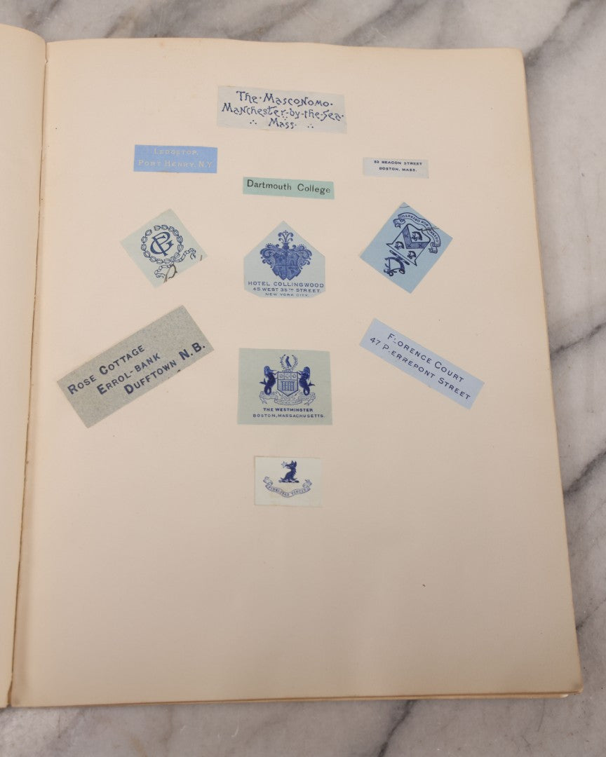 Lot 294 - Antique Scrapbook With Clipped Logos, Seals, And Institutional Names From Colleges, Hotels, Clubs, Banks, Government Offices, And More, Arranged By Color Throughout 20+ Pages, Marbled Cover Boards