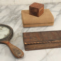 Lot 299 - Grouping Of 4 Vintage And Antique Wooden Boxes And Vanity Items Including Pyrography Box, Hand Mirror, Indian Carved Box, And Remington Rand Case