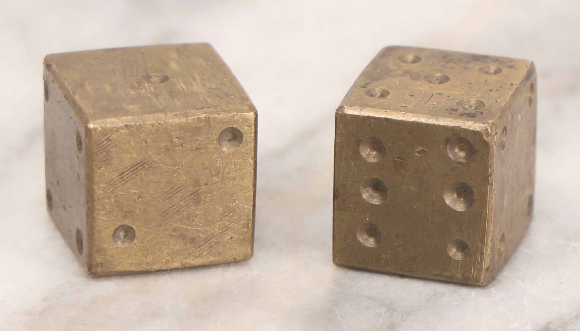 Lot 303 - Vintage Pair Of Solid Brass Gaming Dice With Hand-Finished Surfaces And Natural Patina, Circa Mid-20th Century
