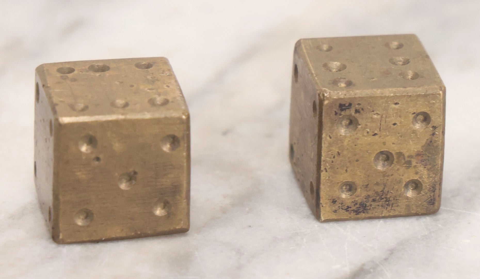 Lot 303 - Vintage Pair Of Solid Brass Gaming Dice With Hand-Finished Surfaces And Natural Patina, Circa Mid-20th Century