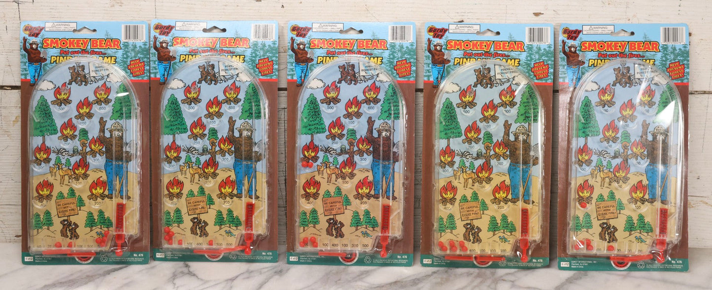 Lot 306 - Grouping Of Five Modern Smokey Bear Pinball Games, Licensed Forest Fire Prevention Educational Toys, Gordy International, Plainfield, New Jersey
