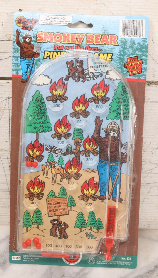 Lot 306 - Grouping Of Five Modern Smokey Bear Pinball Games, Licensed Forest Fire Prevention Educational Toys, Gordy International, Plainfield, New Jersey