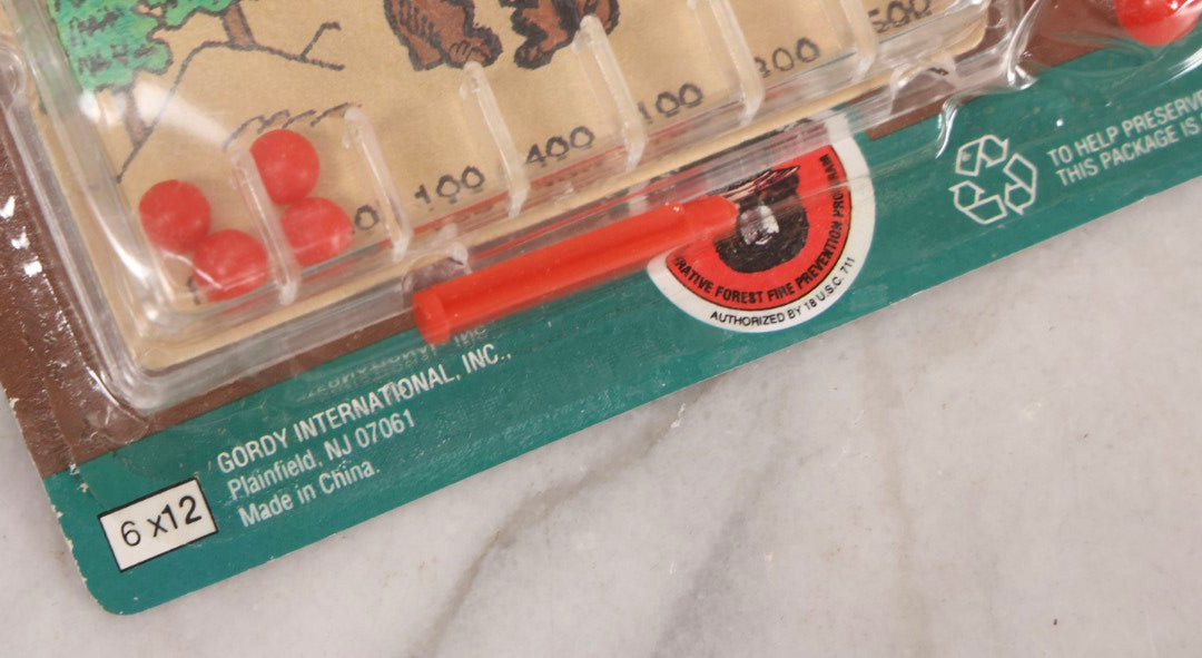 Lot 306 - Grouping Of Five Modern Smokey Bear Pinball Games, Licensed Forest Fire Prevention Educational Toys, Gordy International, Plainfield, New Jersey