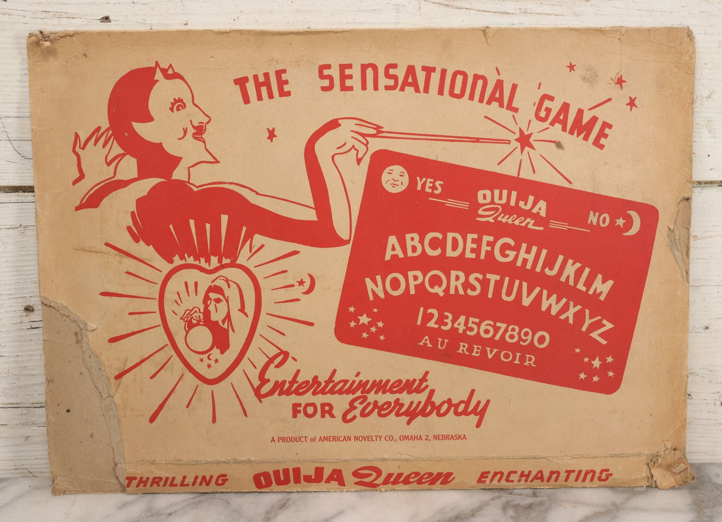 Lot 001 - Vintage Ouija Queen "The Mysterious Talking Board" With Partial Box With Devil Graphics, American Novelty Co., Omaha, Nebraska
