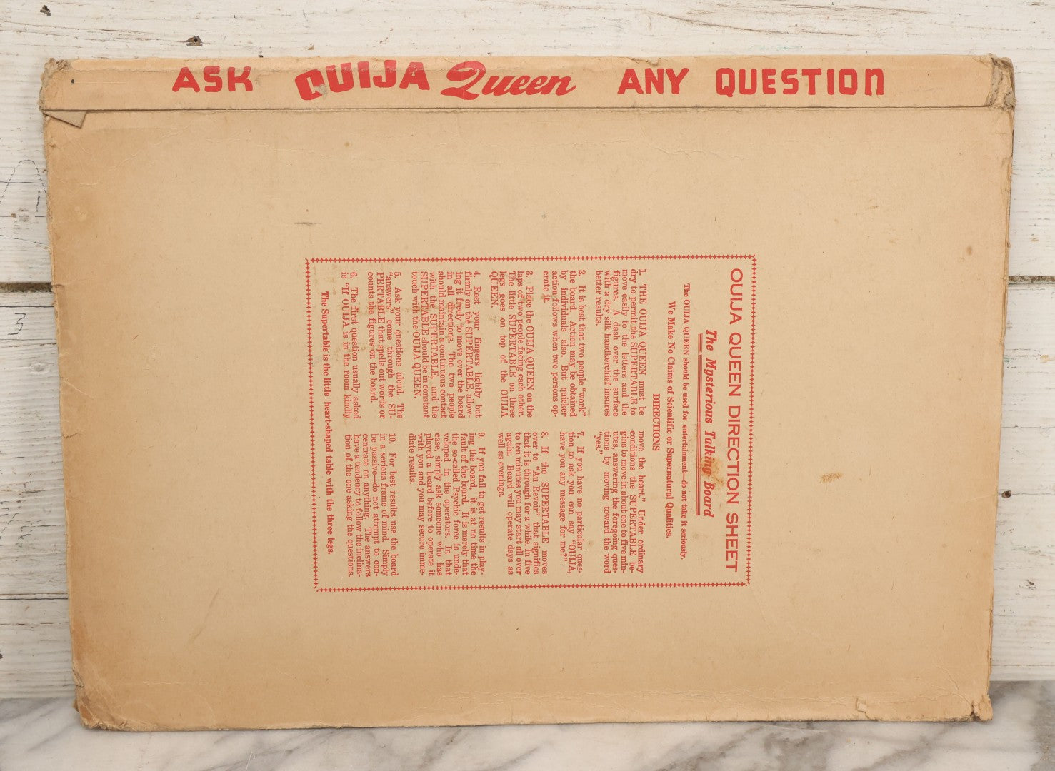 Lot 001 - Vintage Ouija Queen "The Mysterious Talking Board" With Partial Box With Devil Graphics, American Novelty Co., Omaha, Nebraska