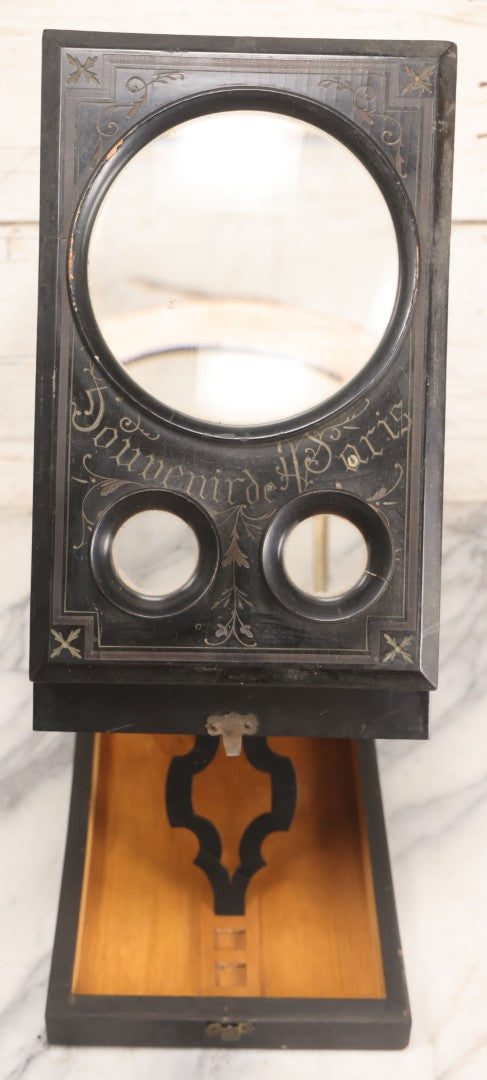 Lot 005 - Antique Black Lacquered Wooden Graphoscope Folding Table Top Stereo Card And Photograph Viewer "Souvenir De Paris", Note Center Lens Has Chip, 6-7/8" x 10-3/4"
