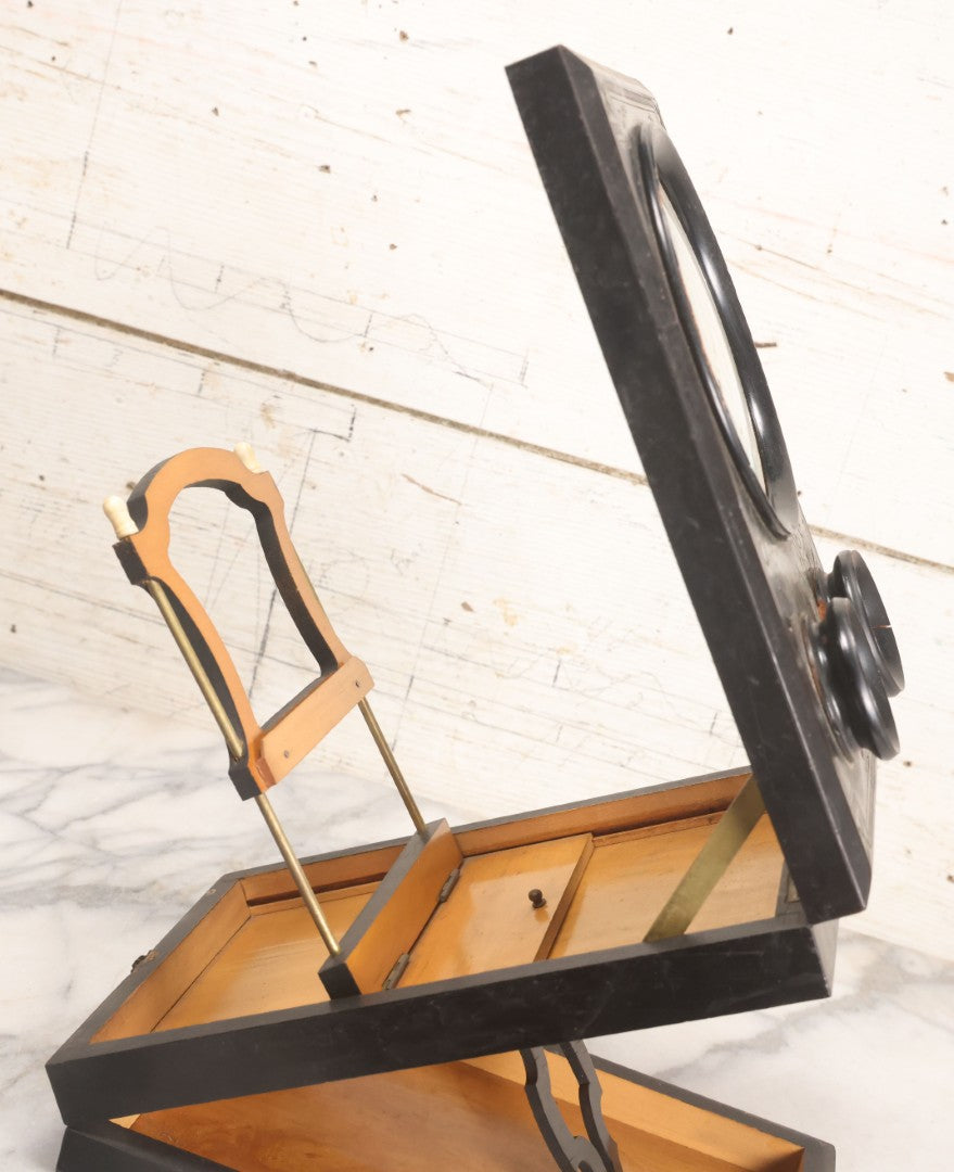 Lot 005 - Antique Black Lacquered Wooden Graphoscope Folding Table Top Stereo Card And Photograph Viewer "Souvenir De Paris", Note Center Lens Has Chip, 6-7/8" x 10-3/4"