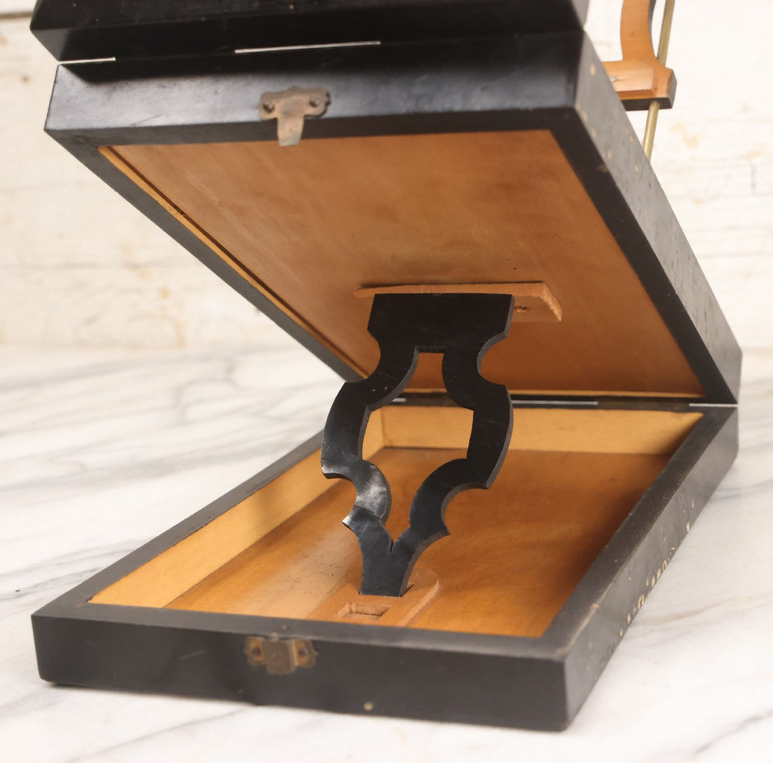 Lot 005 - Antique Black Lacquered Wooden Graphoscope Folding Table Top Stereo Card And Photograph Viewer "Souvenir De Paris", Note Center Lens Has Chip, 6-7/8" x 10-3/4"