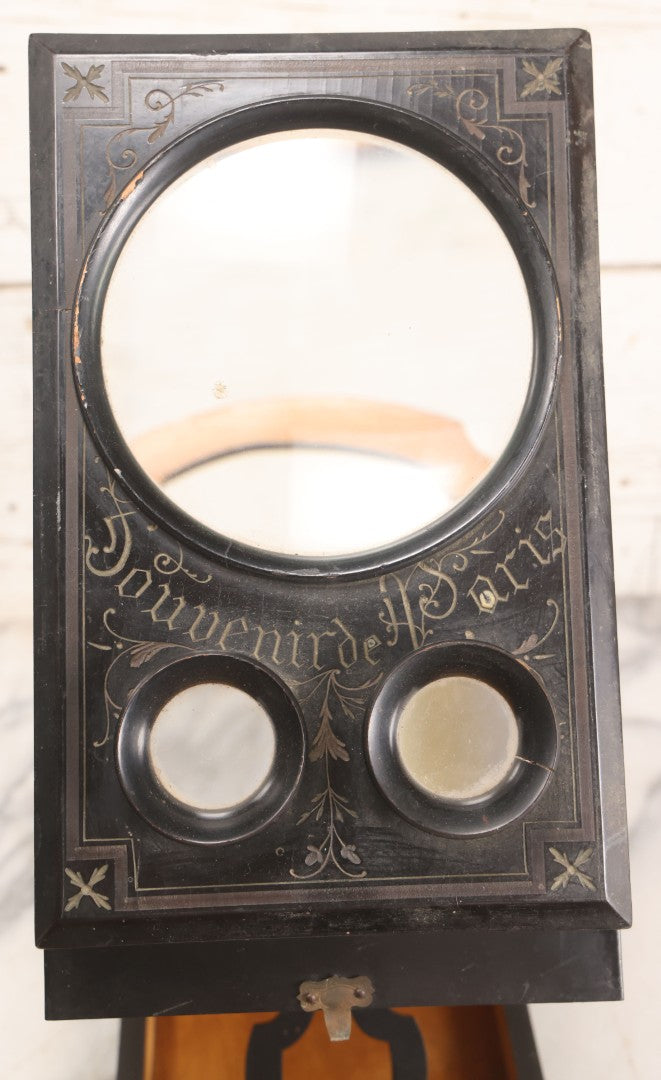 Lot 005 - Antique Black Lacquered Wooden Graphoscope Folding Table Top Stereo Card And Photograph Viewer "Souvenir De Paris", Note Center Lens Has Chip, 6-7/8" x 10-3/4"