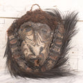 Lot 018 - Vintage African-Style Mask With Woven Fiber, Cowrie Shell Decoration, Animal Skull Element, And Hair Fringe, 11" x 15"