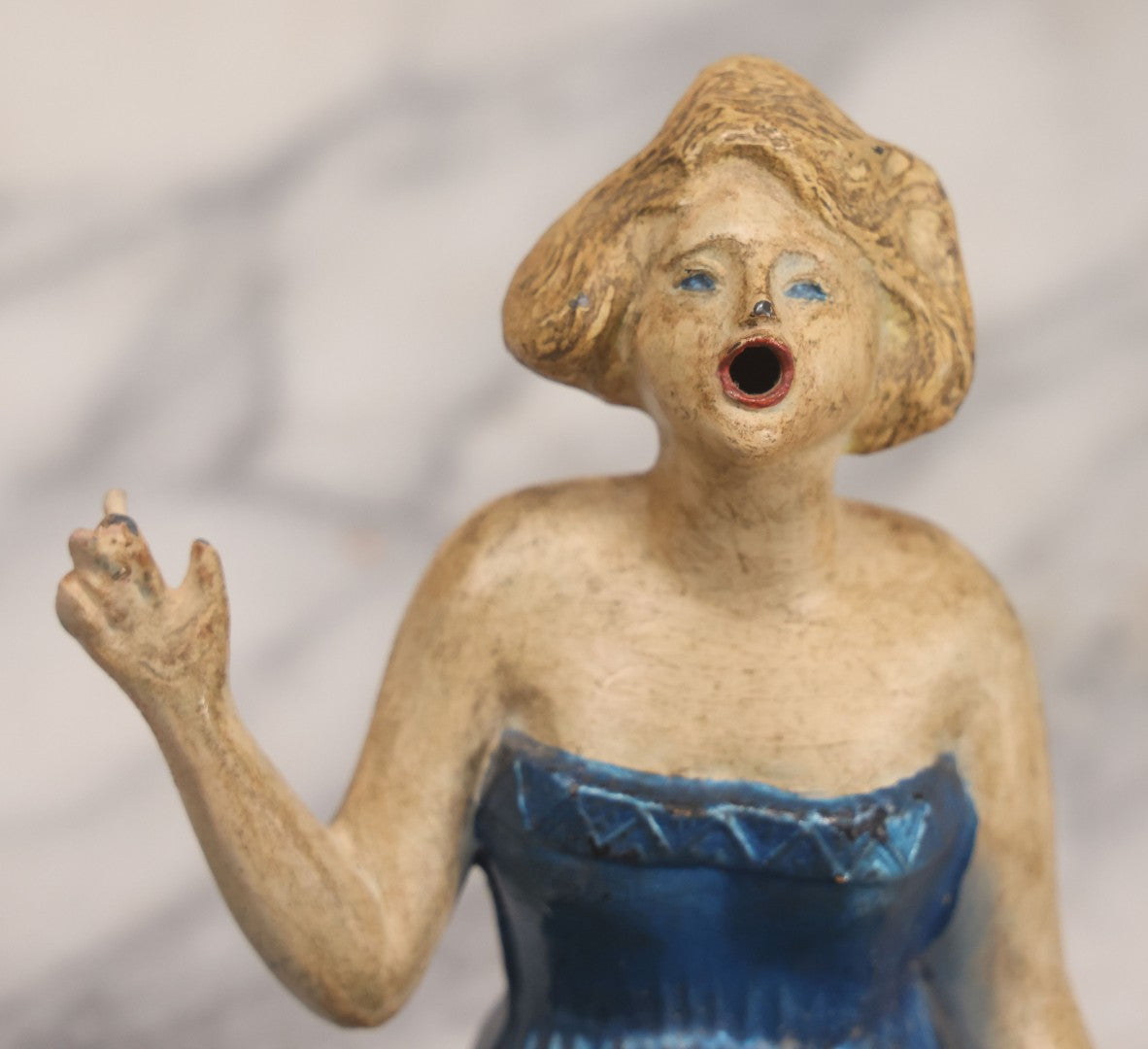 Lot 024 - Vintage Painted Cast White Metal Art Deco Incense Burner Depicting A Blonde Woman In Blue Dress Holding A Cigarette