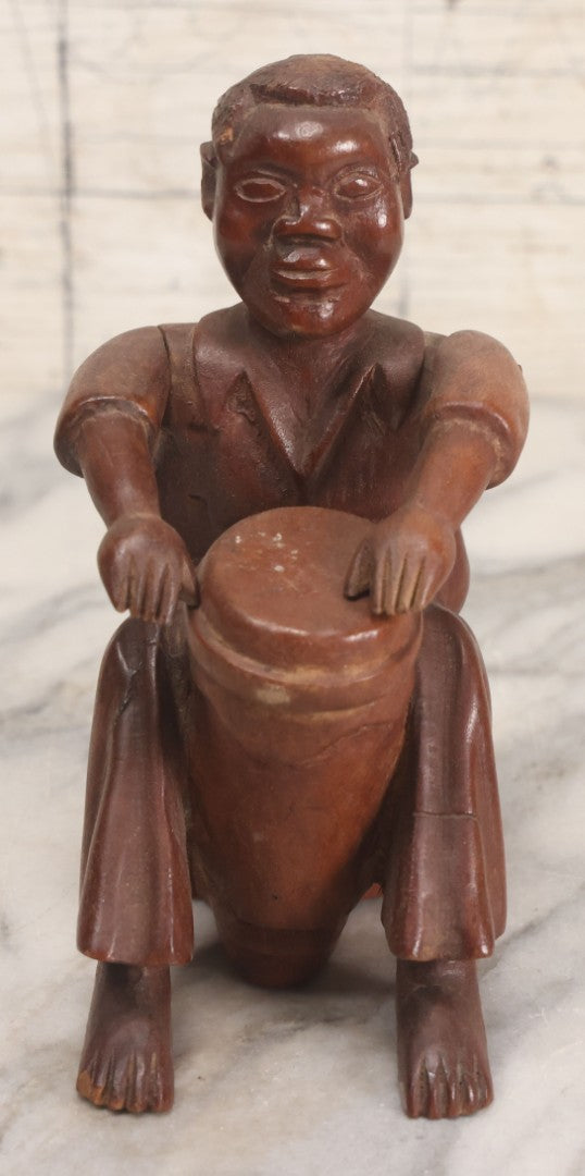 Lot 029 - Vintage Folk Art Carved Wood Figure With Posable Arms Depicting A Seated Man With Drum, 6-1/4" H