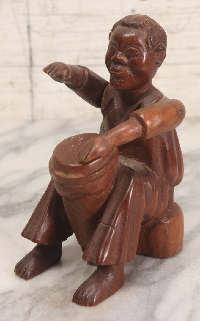 Lot 029 - Vintage Folk Art Carved Wood Figure With Posable Arms Depicting A Seated Man With Drum, 6-1/4" H