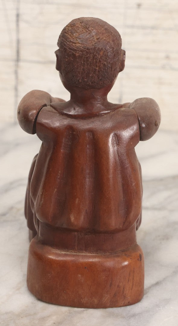Lot 029 - Vintage Folk Art Carved Wood Figure With Posable Arms Depicting A Seated Man With Drum, 6-1/4" H