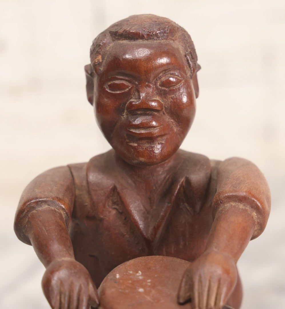 Lot 029 - Vintage Folk Art Carved Wood Figure With Posable Arms Depicting A Seated Man With Drum, 6-1/4" H