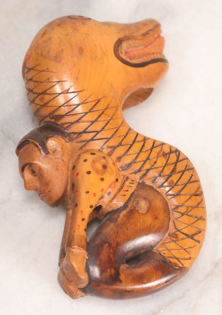 Lot 031 - Vintage Folk Art Carved Wood Cane Topper Depicting A Frightened Man Riding A Serpent, 4" H