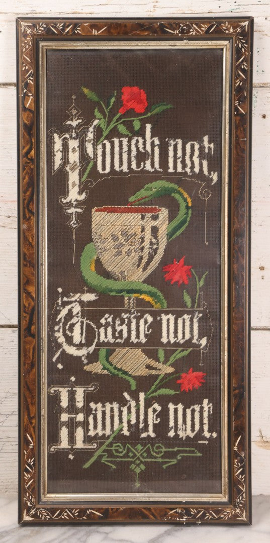 Lot 037 - Antique Victorian Framed Punchwork Embroidery Sampler With Temperance Motto "Touch Not, Taste Not, Handle Not" With Chalice, Serpent, And Floral Motifs, 10-7/8" x 23-1/4"