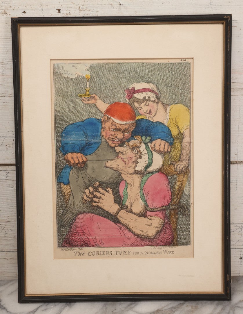 Lot 041 - Antique Hand Colored Caricature Print "The Coblers Cure For A Scolding Wife" By Thomas Rowlandson, Depicting A Cobler Sewing His Wife's Mouth Shut, Published By Thomas Tegg, Circa 1810, Framed, No Glass, 14-1/8" x 18-5/8"
