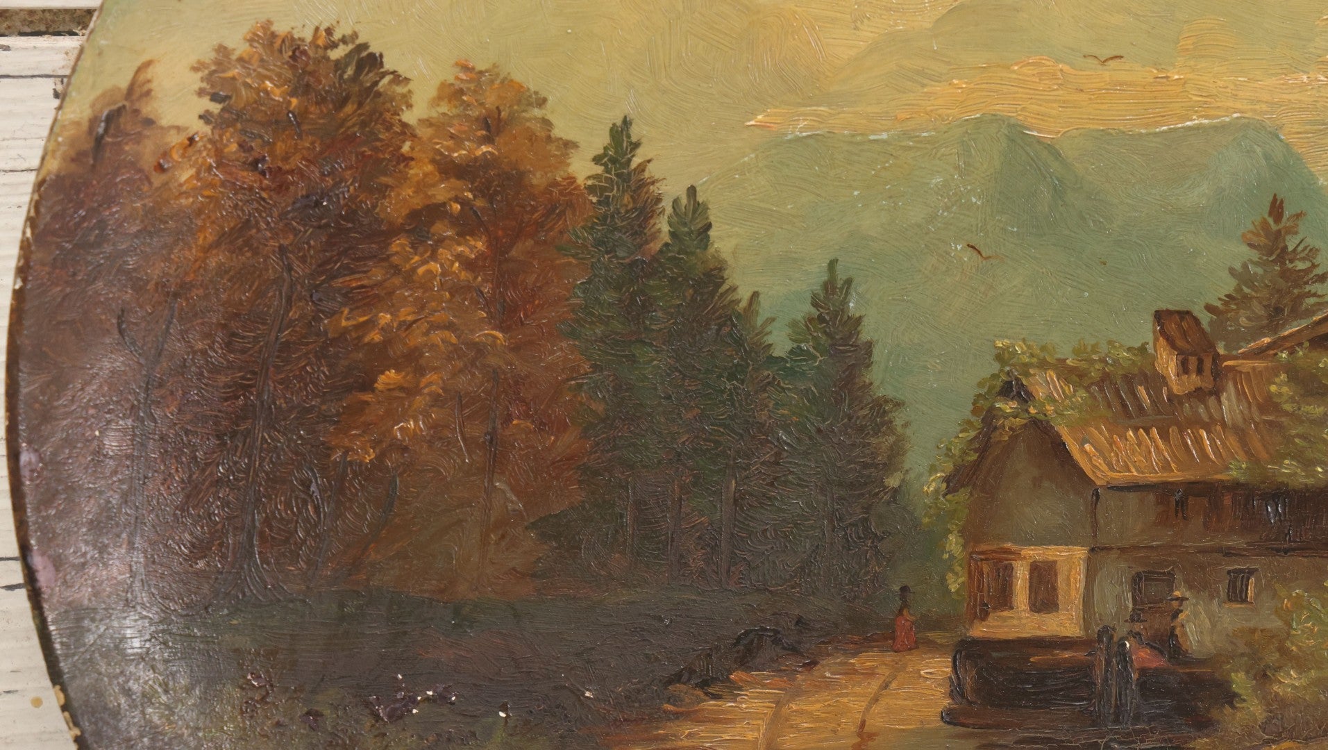 Lot 045 - Antique Folk Art Hand Painted Papier Mache Charger With Rustic Cottage, Mountain Landscape, And Autumn Trees, Circa 1880, 12" Diameter