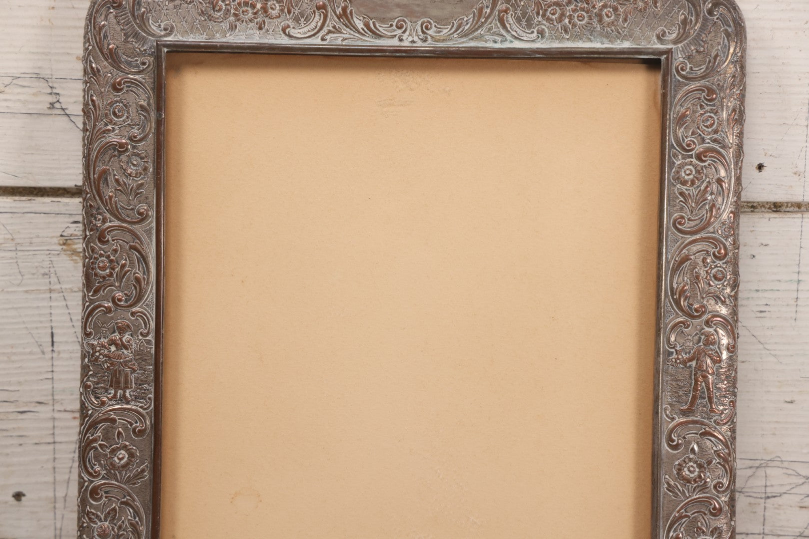 Lot 054 - Antique French Silvered Bronze Picture Frame With Repoussé Floral Scrollwork And Figural Scenes, With Glass, Circa Early 20th Century, 10-3/4" x 13-1/2"