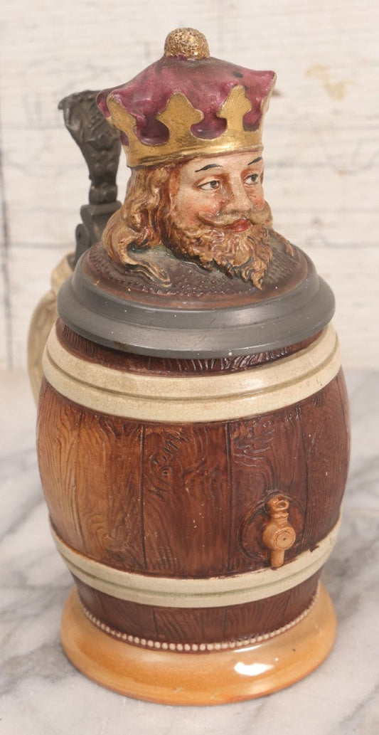 Lot 056 - Antique German Beer Stein With King Figural Lid, Hinged Pewter Top, Marked D.R.G.M. 154927 And Germany, Adolf Diesinger No. 705, Circa 1900, 7-3/4" H