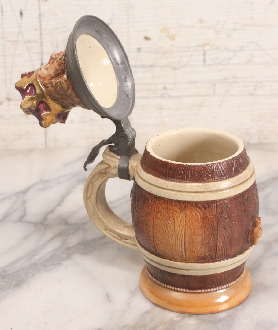 Lot 056 - Antique German Beer Stein With King Figural Lid, Hinged Pewter Top, Marked D.R.G.M. 154927 And Germany, Adolf Diesinger No. 705, Circa 1900, 7-3/4" H