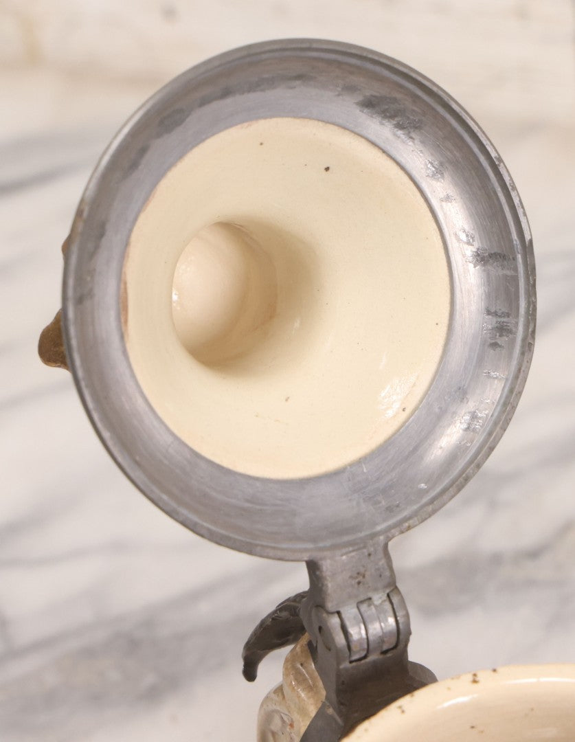 Lot 056 - Antique German Beer Stein With King Figural Lid, Hinged Pewter Top, Marked D.R.G.M. 154927 And Germany, Adolf Diesinger No. 705, Circa 1900, 7-3/4" H