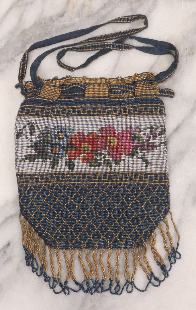Lot 061 - Antique Beaded Drawstring Purse With Floral Panel, Greek Key Border, And Beaded Fringe, Seed Bead Construction