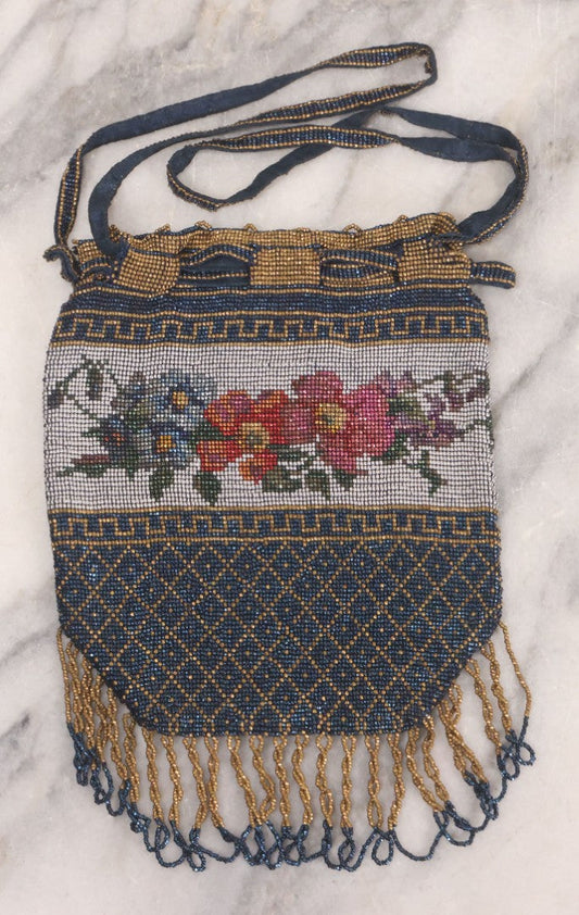 Lot 061 - Antique Beaded Drawstring Purse With Floral Panel, Greek Key Border, And Beaded Fringe, Seed Bead Construction