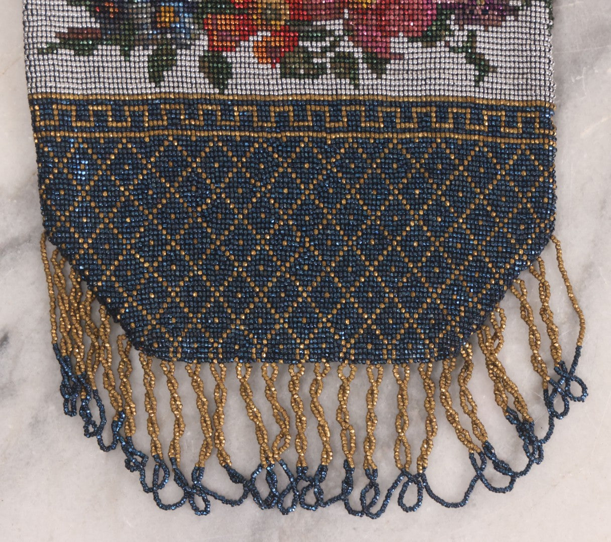 Lot 061 - Antique Beaded Drawstring Purse With Floral Panel, Greek Key Border, And Beaded Fringe, Seed Bead Construction
