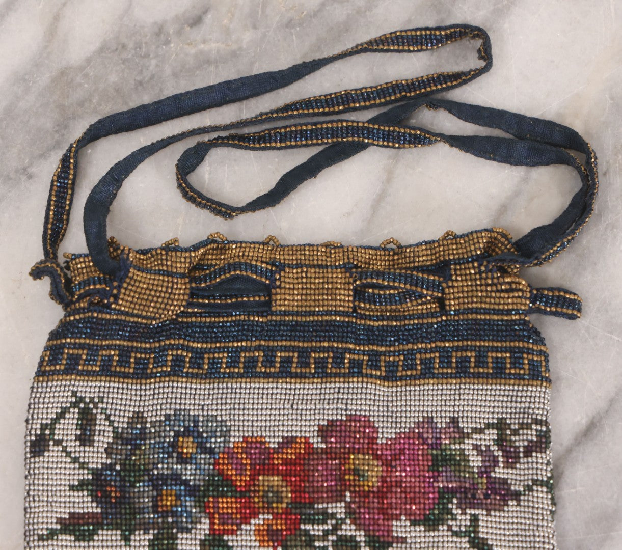Lot 061 - Antique Beaded Drawstring Purse With Floral Panel, Greek Key Border, And Beaded Fringe, Seed Bead Construction
