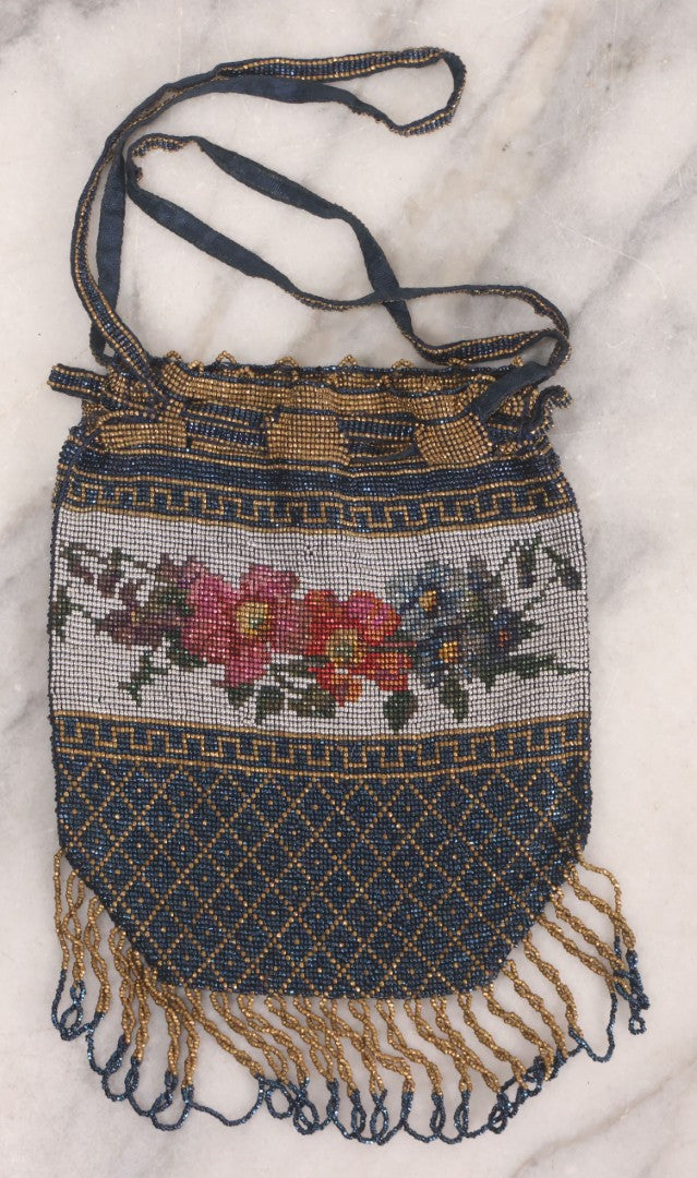 Lot 061 - Antique Beaded Drawstring Purse With Floral Panel, Greek Key Border, And Beaded Fringe, Seed Bead Construction