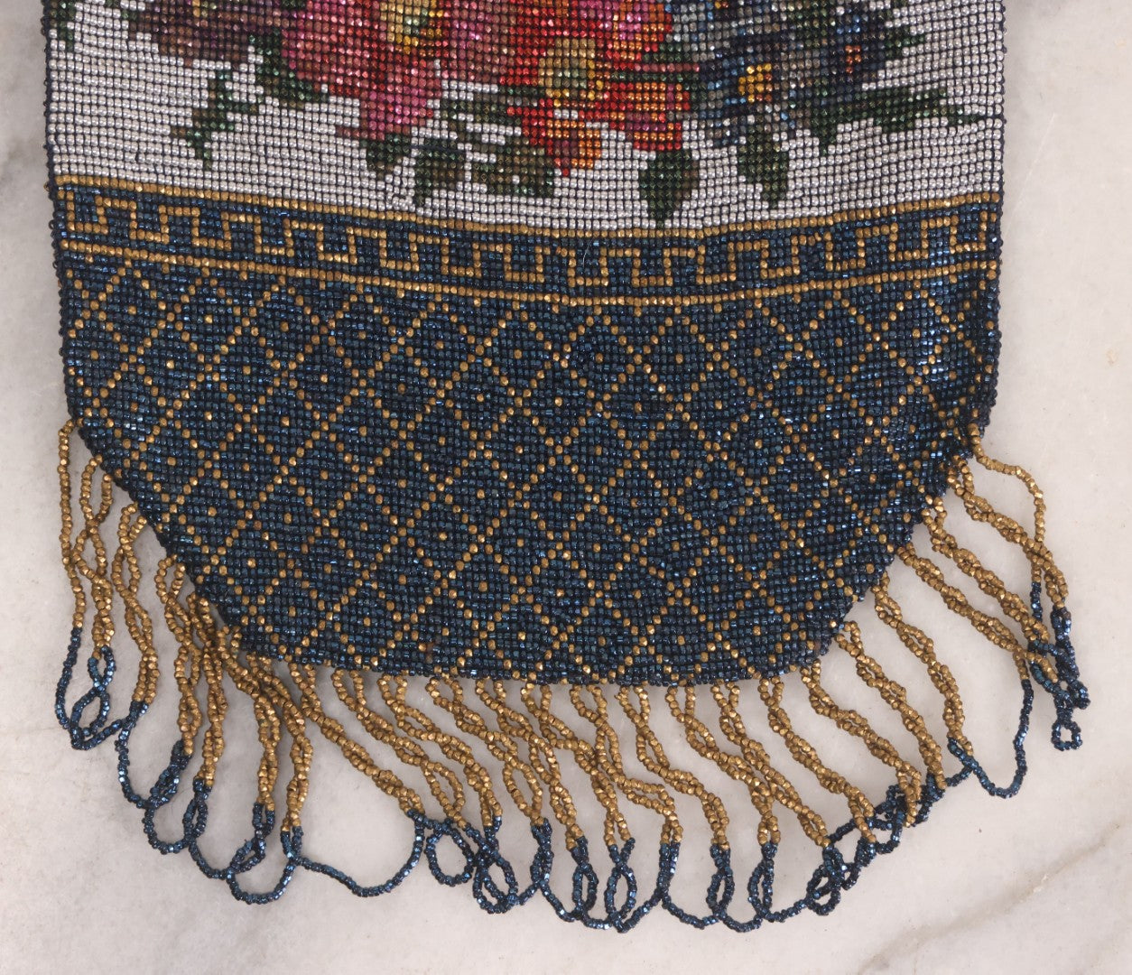 Lot 061 - Antique Beaded Drawstring Purse With Floral Panel, Greek Key Border, And Beaded Fringe, Seed Bead Construction