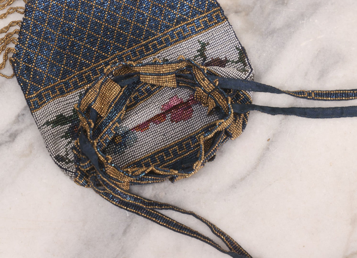 Lot 061 - Antique Beaded Drawstring Purse With Floral Panel, Greek Key Border, And Beaded Fringe, Seed Bead Construction