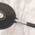 Lot 062 - Vintage Art Deco Hand Mirror With Black Circular Mirror Head And Chrome Handle, Circa 1940s 12-3/4" L