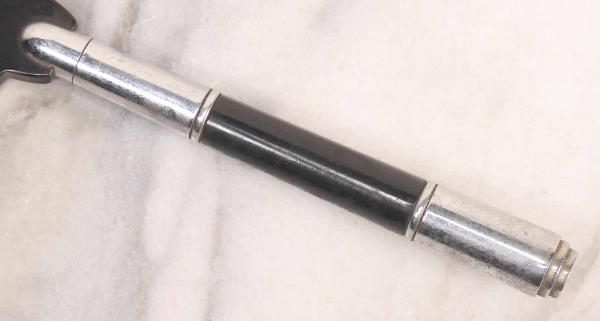 Lot 062 - Vintage Art Deco Hand Mirror With Black Circular Mirror Head And Chrome Handle, Circa 1940s 12-3/4" L