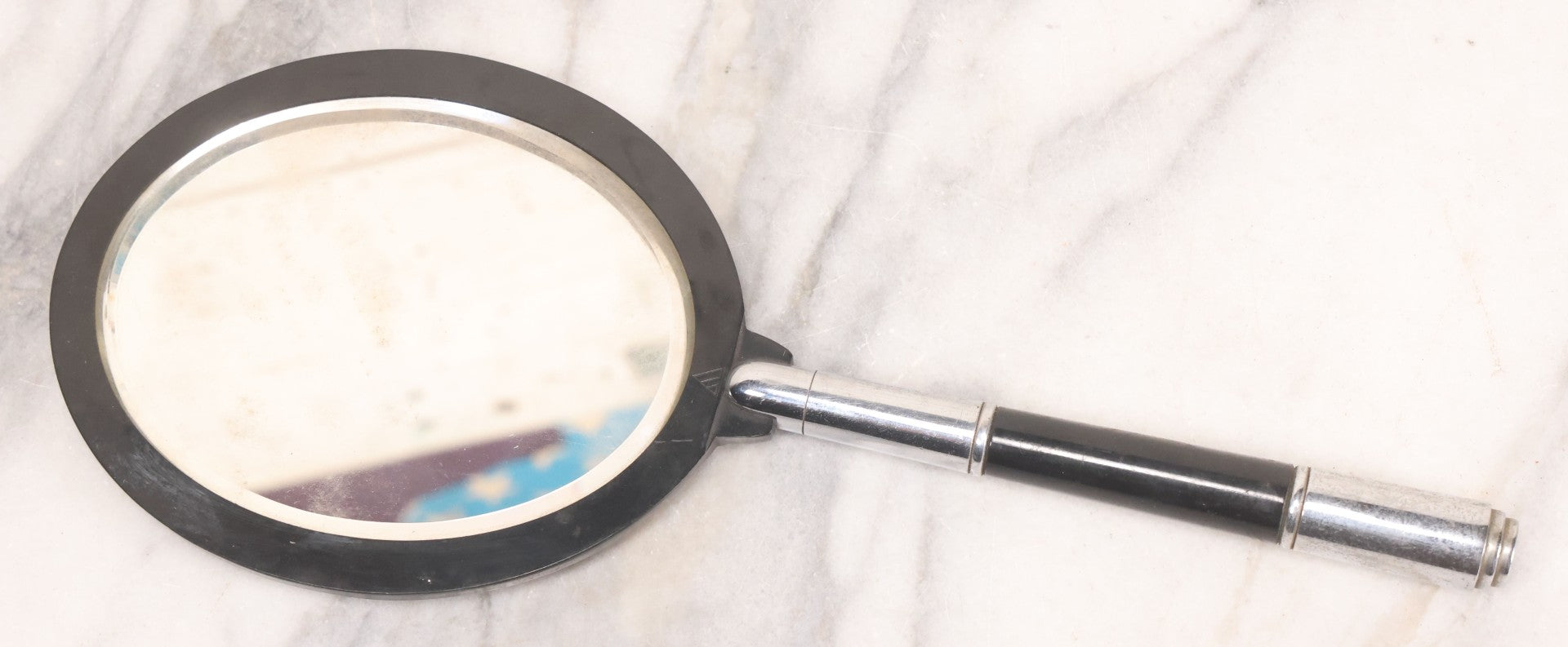 Lot 062 - Vintage Art Deco Hand Mirror With Black Circular Mirror Head And Chrome Handle, Circa 1940s 12-3/4" L