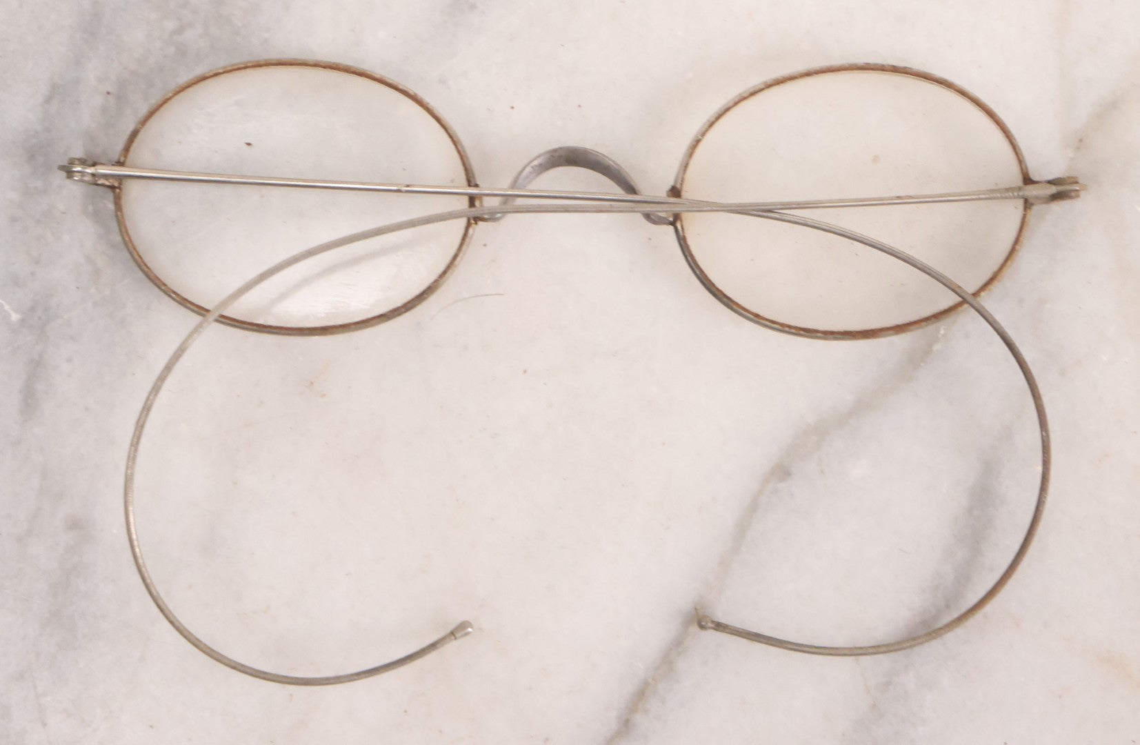 Lot 063 - Grouping Of Four Antique Wire Frame Spectacles Including Blue Lens Spectacles, With Two Partial Leather Cases, Edward E. Dammers, Worcester, Massachusetts