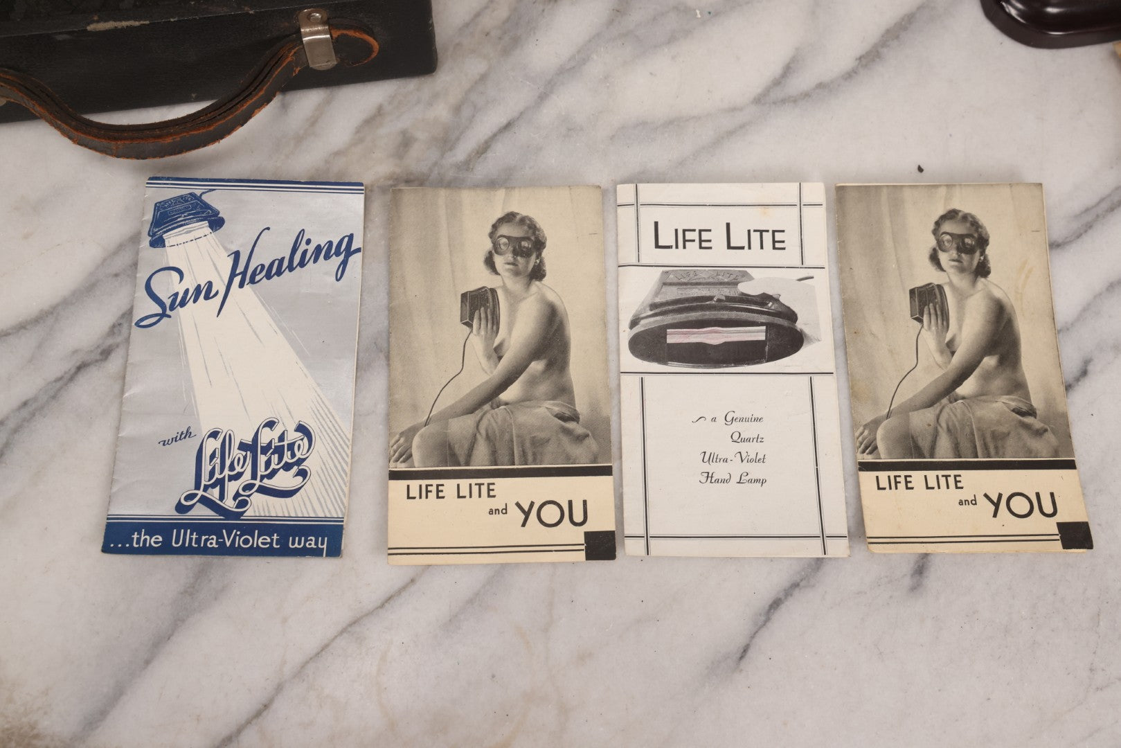 Lot 065 - Vintage Life Lite Model A Ultra-Violet Home Lamp “Quack Medicine” Kit In Carrying Case, Bakelite Construction, Ultra-Violet Home Products Inc., Los Angeles, California, With Ephemera And Manuals, Circa 1930s